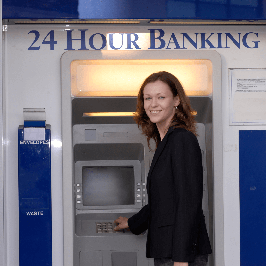 woman at ITM machine